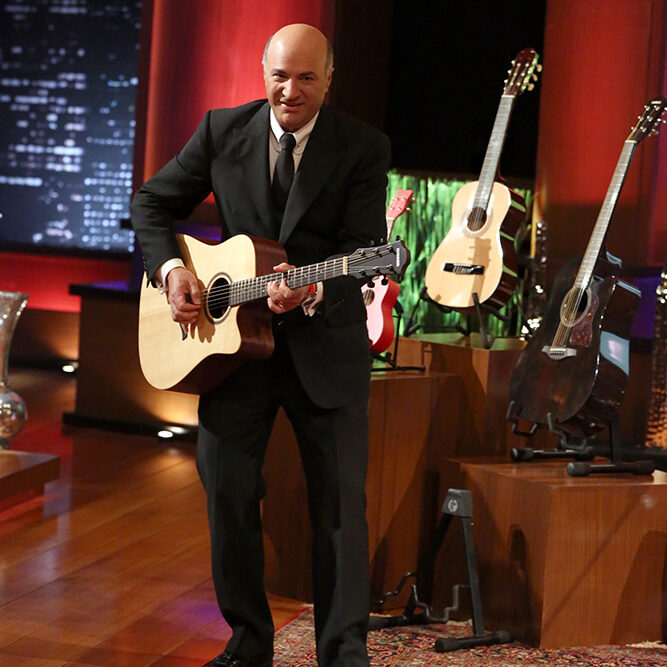 KEVIN O'LEARY (TAYLOR ROBINSON MUSIC) SHARK TANK - "Episode 524" - A guitar player from Dallas, TX hopes to sing his way into a deal for his service that helps people find and hire music instructors; a firefighter from San Diego, CA has come up with a simple way to stop costly, accidental fire sprinkler activations; two friends from Salt Lake City, UT show how they can turn fire and water into a battery charger; and two men from Chicago, IL hope the Sharks will get on board with their indoor trackless train that can be used at the mall or even private parties. In a follow up segment, Tiffany Krumins from Auburn, GA and creator of Ava the Elephant medicine dispenser gives an update on her business, which Barbara invested in during Season One, on "Shark Tank," FRIDAY, APRIL 11 (9:00-10:01 p.m., ET) on the ABC Television Network. (ABC/Adam Taylor)
KEVIN O'LEARY (TAYLOR ROBINSON MUSIC)